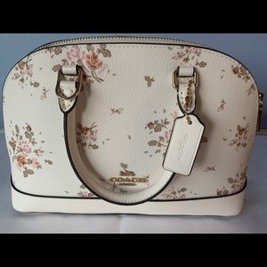 Coach handbag with handles and detachable strap
